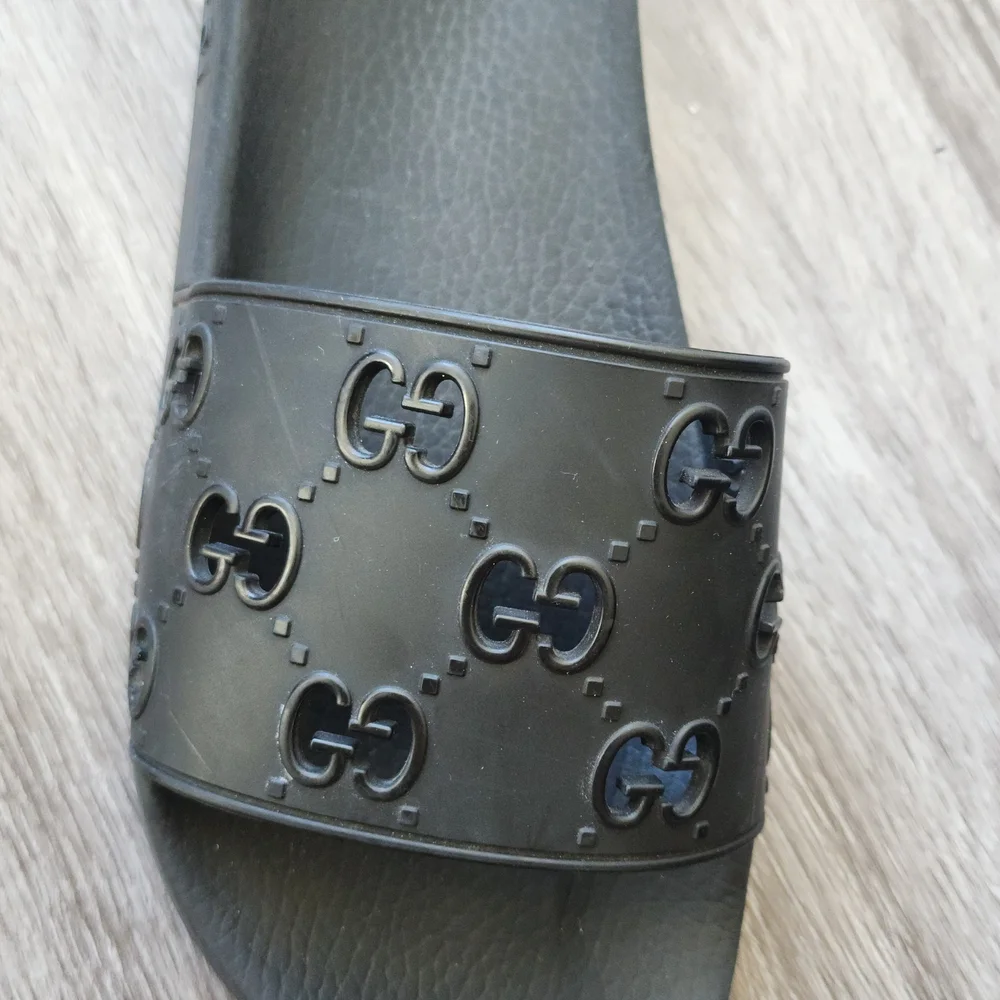 Gucci Embossed Black Slide Sandals - Picture 2 of 6